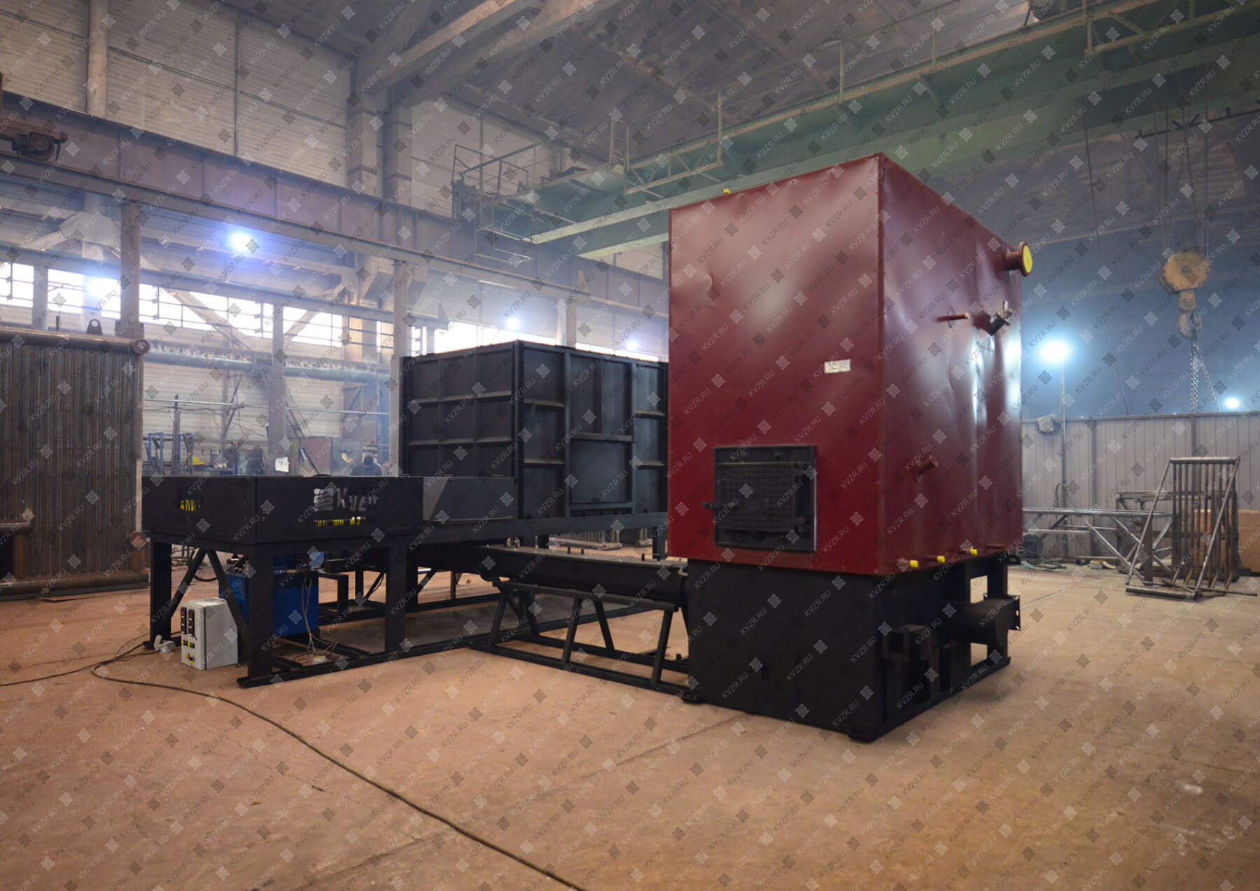 Водогрейный котел на опилках с механизированным бункером живое дно